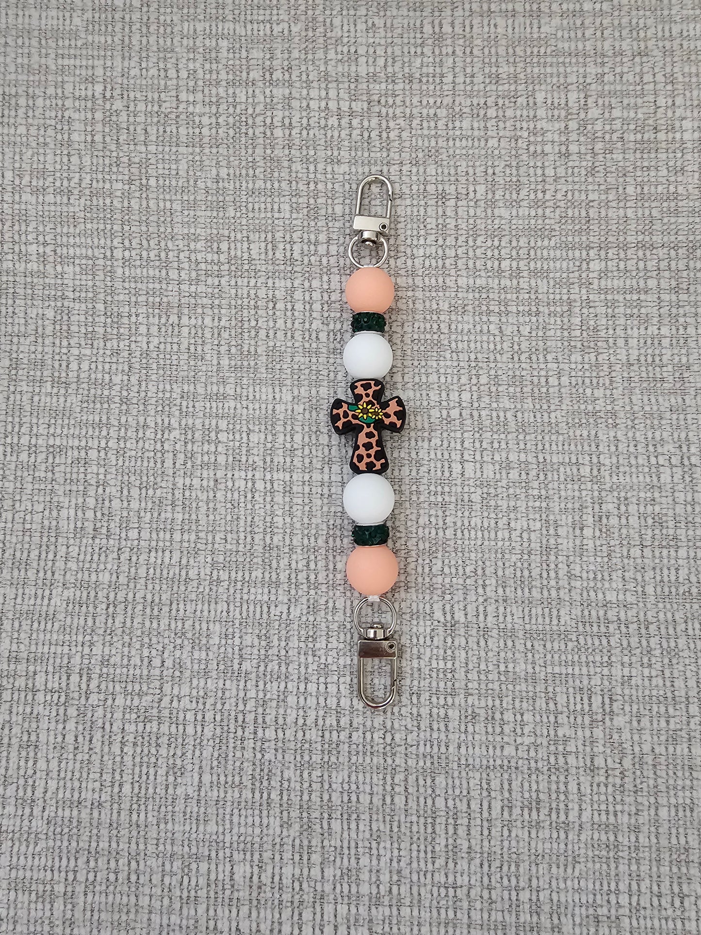 Phone Hand Strap/ Kindle Strap/ iPad Strap Interchangeable - Silicone Beaded Strap Peach/White Cross Focal with Green Rhinestones